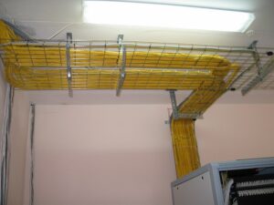 Laying cables and wires in cable trays and ducts